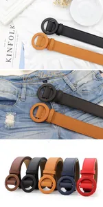 Close-up showing the minimalist round buckle detail and smooth leather texture of the belt