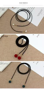 Detaillierte Ansicht der Taillenkette für Damen mit Perlen sowie roten und grünen Kugeln
