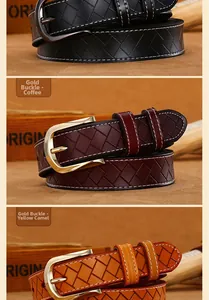 Dettaglio di cinture in pelle intrecciata con cuciture a contrasto e fibbie in metallo
