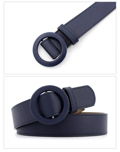 Close-up of a navy blue leather belt featuring a large round buckle and stitched edge