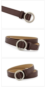 Détails d'une ceinture fine en cuir marron foncé avec boucle ronde en métal argenté poli