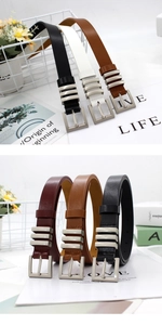 Detail of four colorful thin belts with silver square buckles and metal bar accents