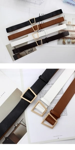 Detail showing various colors of women's leather belts with trapezoid golden metal buckles