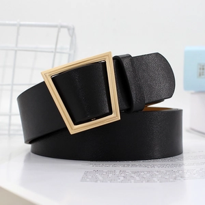 Women's black faux leather belt with a trendy gold geometric buckle for casual outfits