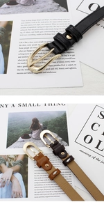 Three slim women's belts in black, brown, and coffee with classic gold oval buckles