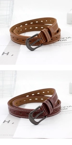 Detail of slim hollowed leather belts with metal D-buckle and contrast stitching