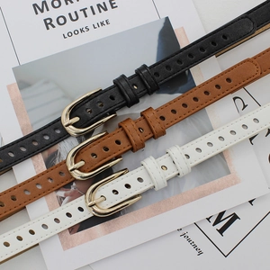 Women's slim fashion waist belts in black, brown, and white with gold horseshoe buckles