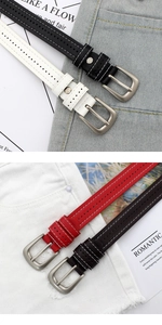 Detail of slim leather belts with contrast stitching and matte metal buckle in four colors