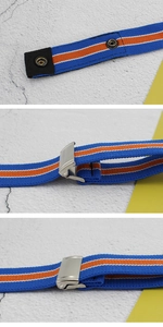 Close-up of elastic striped belt with blue orange weave and metal buckle detail