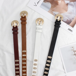 Set of slim leather belts for women with round golden buckles and metal eyelets