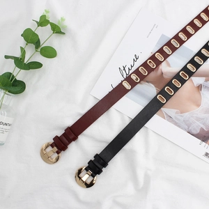 Chic women's leather belt with gold oval eyelets and round buckle in black and brown