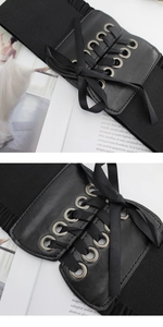 Detail of black corset belt showing elastic band, PU leather panel and ribbon lacing