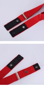 Detail view of the red elastic belt with black fabric joints and silver metal snap buttons