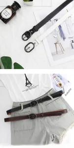 Détail de ceintures fines avec boucles ovales en métal et surpiqûres décoratives blanches