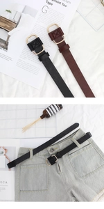 Detail of slim faux leather women belt with golden D-ring buckle on denim shorts