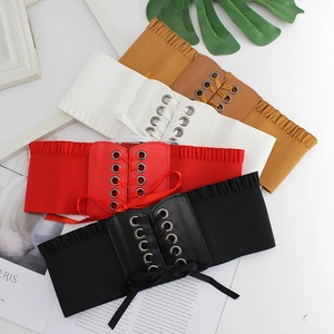 Elastic wide corset belt for women featuring decorative lace-up bow and metal eyelets