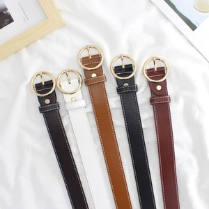 Set of five vintage leather belts with gold round buckles in various colors for women