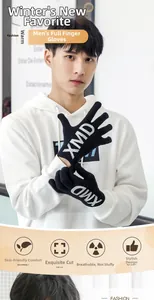 Detail of black knitted men's winter gloves with white XMD logo and touchscreen fingers