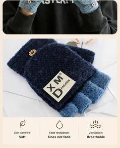 Detail view of thickened plush lining in blue knitted flip-top fingerless gloves