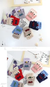 Detailed close-up of colorful cartoon deer knit flip-top gloves for children in various colors
