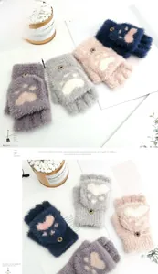 Detailed view of plush cat paw fingerless gloves in navy, pink, grey and purple