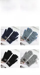 Detailed grid view of men's knitted touchscreen gloves in navy, blue, black, and gray