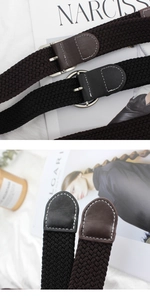 Close-up of elastic woven belt details featuring square metal buckle and leather ends