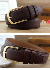 Close-up of a dark brown PU leather belt featuring a polished gold pin buckle on wood