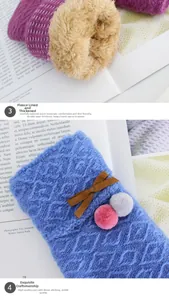 Detail of warm winter knit gloves with thick fleece lining and decorative faux fur pom poms