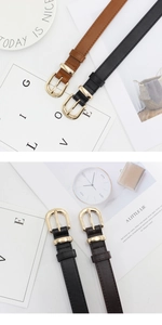 Détail de ceintures minimalistes en cuir avec boucles dorées en fer à cheval noir et marron