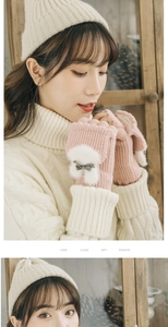 Close-up of pink knitted flip-top gloves with white plush faux fur bunny decor and bow