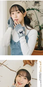 Detailed view of grey knitted half-finger gloves with plush patches and black bow ribbons