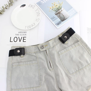 Elastic no-buckle invisible belt for jeans featuring silver snap buttons on grey fabric