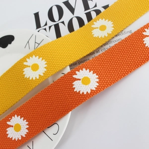 Daisy print canvas belt with double ring buckle in yellow and orange floral style