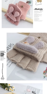 Detailed view of the cozy knitted flip-top gloves with cute plush bunny ears and flower decor