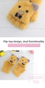 Detail view of yellow plush flip-top bear mittens showing the soft texture and button