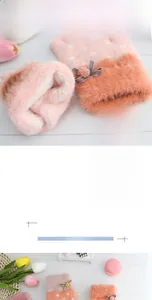 Detail of soft pink plush fingerless gloves featuring white polka dots and cute bowknot