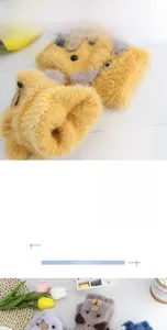Detailed macro view of soft faux mink fur texture and plush bear ears on children gloves