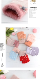 Close-up of colorful knit fingerless gloves with bow ties and faux fur cuffs for kids