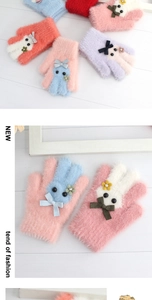 Detailed view of colorful winter mink velvet gloves featuring cute cartoon rabbit designs