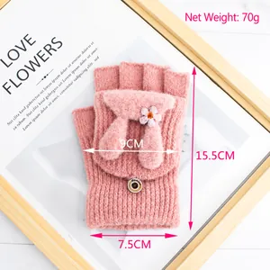 Cute pink knitted convertible fingerless gloves with rabbit ears and floral accent