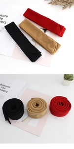 Detail view of thickened velvet waist belts in black, khaki, and red colors with a soft texture