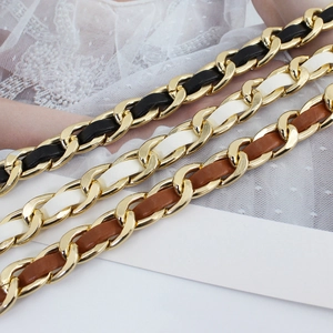 Elegant gold chain belt with interwoven leather in black white and brown colors