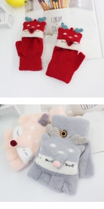 Detail of cute knitted fox gloves for kids with functional flip top and button closure