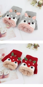 Close-up of children's reindeer knit gloves showing the warm plush fleece lining and details