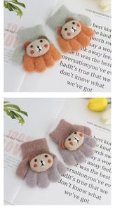 Detail of cute bear cartoon knitted winter gloves for toddlers in green and orange colors