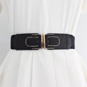 Women's black 4cm elastic waist belt with gold-toned metal geometric buckle on white dress