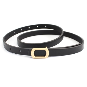 Minimalist black slim waist belt for women with elegant matte gold oval metal buckle