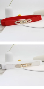 Dettagli di cinture elastiche a fiocco con fibbie in strass dorati nei colori rosso e bianco