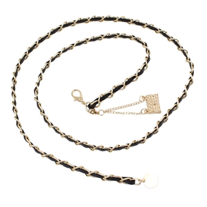 Elegant gold metal chain belt interwoven with black leather featuring decorative accents